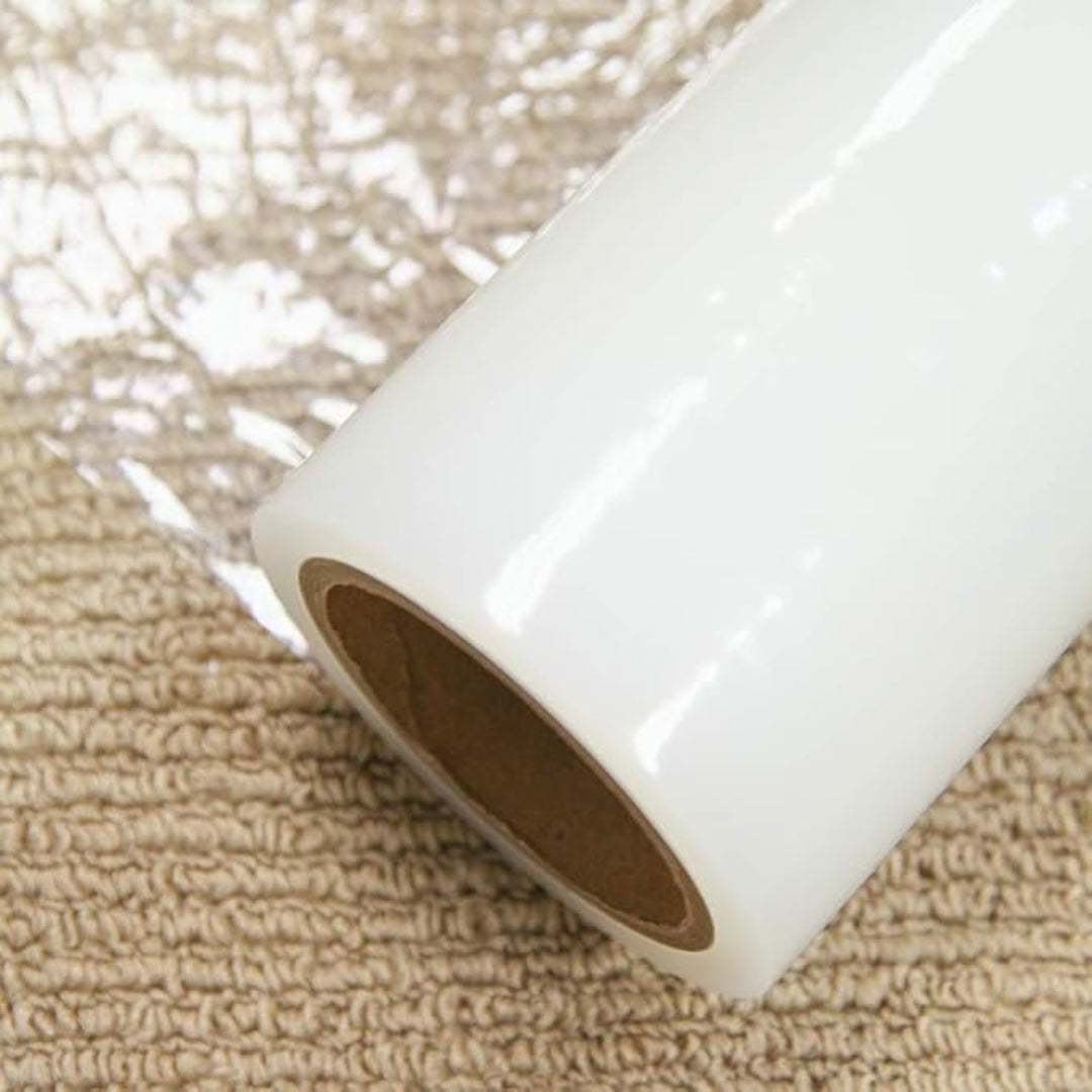close up of carpet protection film showing adhesive backing