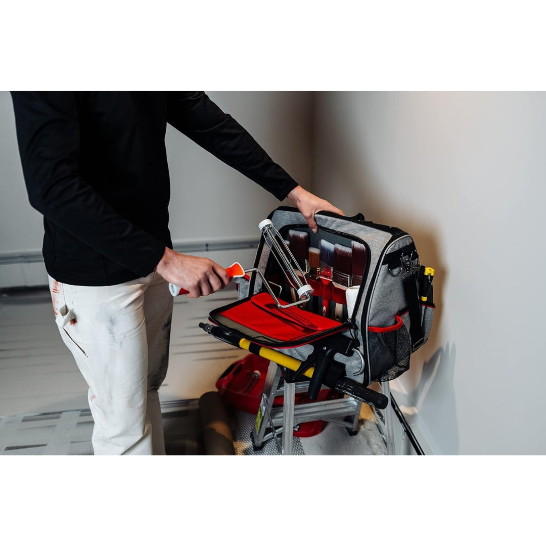 Open Handy Products Deluxe Tool Bag showing red-lined compartments ready for paint tools and accessories.