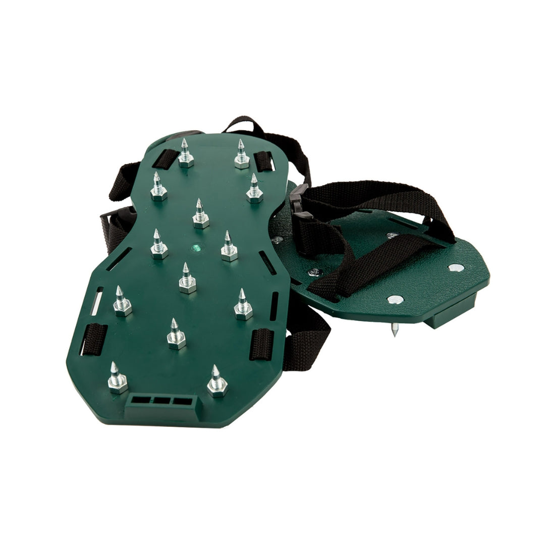 Spiked gunite shoes angled view showing metal spikes and secure straps for walking on wet epoxy and concrete